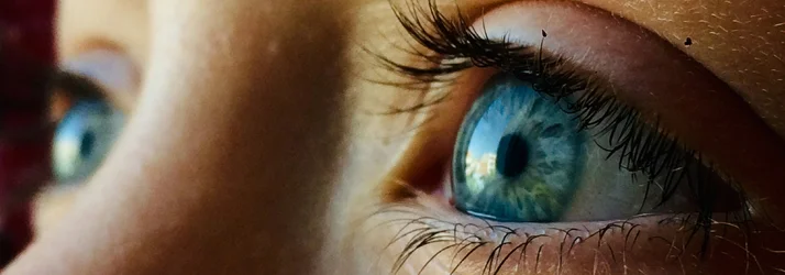 A close up of a blue eye.